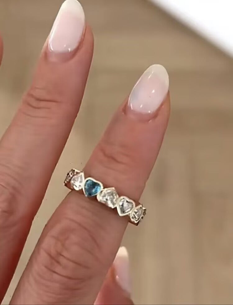 50% mag TIKTOK LIVESTREAM 14K yellow gold heart shape 3mm eternity band featuring emerald and citrine as the first two center hearts upright. The remaining hearts accented with diamonds in an alternating up-and-down pattern in a size 8.