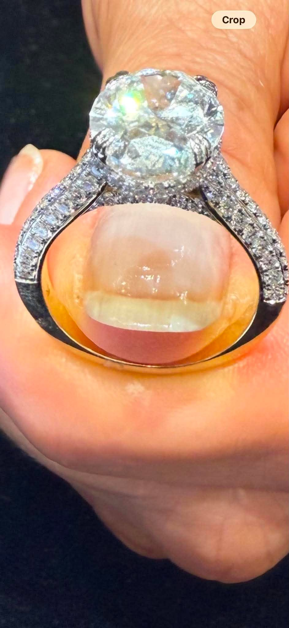 CA Owen deposit link 14K yellow Gold 6ct oval E VS1  double clawas with hildden halo and hidden bridge paved and 3-row setting band size 6