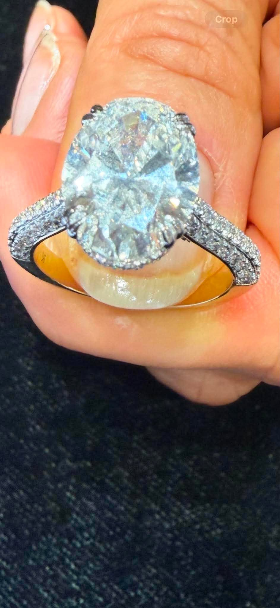 CA Owen deposit link 14K yellow Gold 6ct oval E VS1  double clawas with hildden halo and hidden bridge paved and 3-row setting band size 6