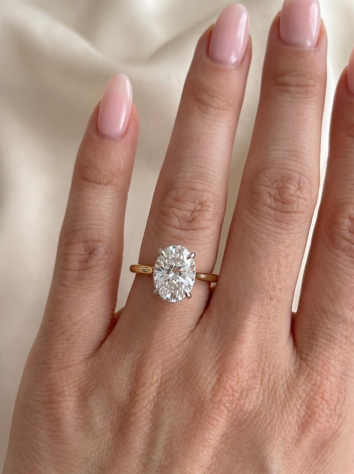 Oli TIKTOK LIVESTREAM 14K yellow gold 4 CARATS Oval D color VVS2 with IGI certificate size