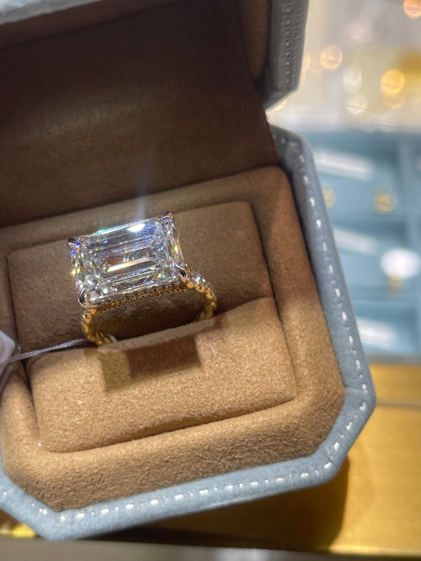 TIKTOK LIVESTREAM 18K 14K 6ct emerald cut east west paved band 2-tone halo arround stone but no diamonds and diamonds on band