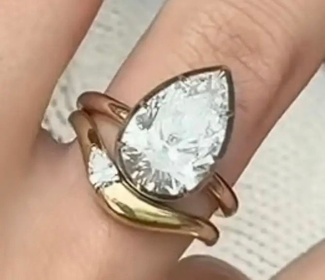 Arth TIKTOK LIVESTREAM 2-2 link 2mm band width platinum 3ct center pear low profile bezek setting size 4.25 with a matching band (Copy)
